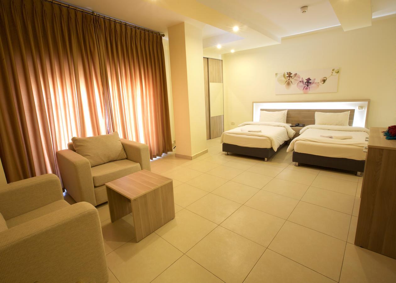 Lujain Hotel فندق النور واللجين Амман Номер фото